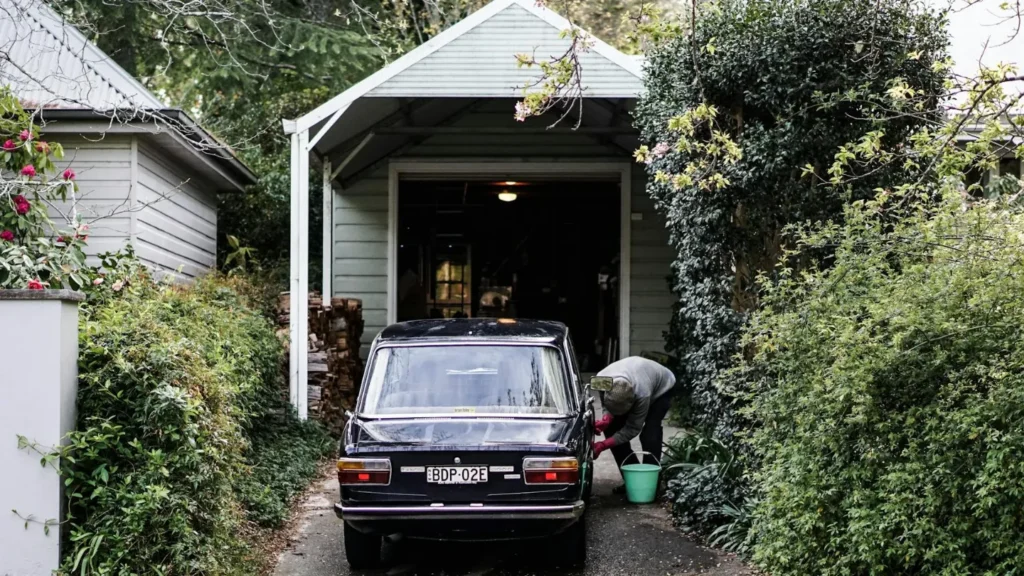 a car in front of a garage