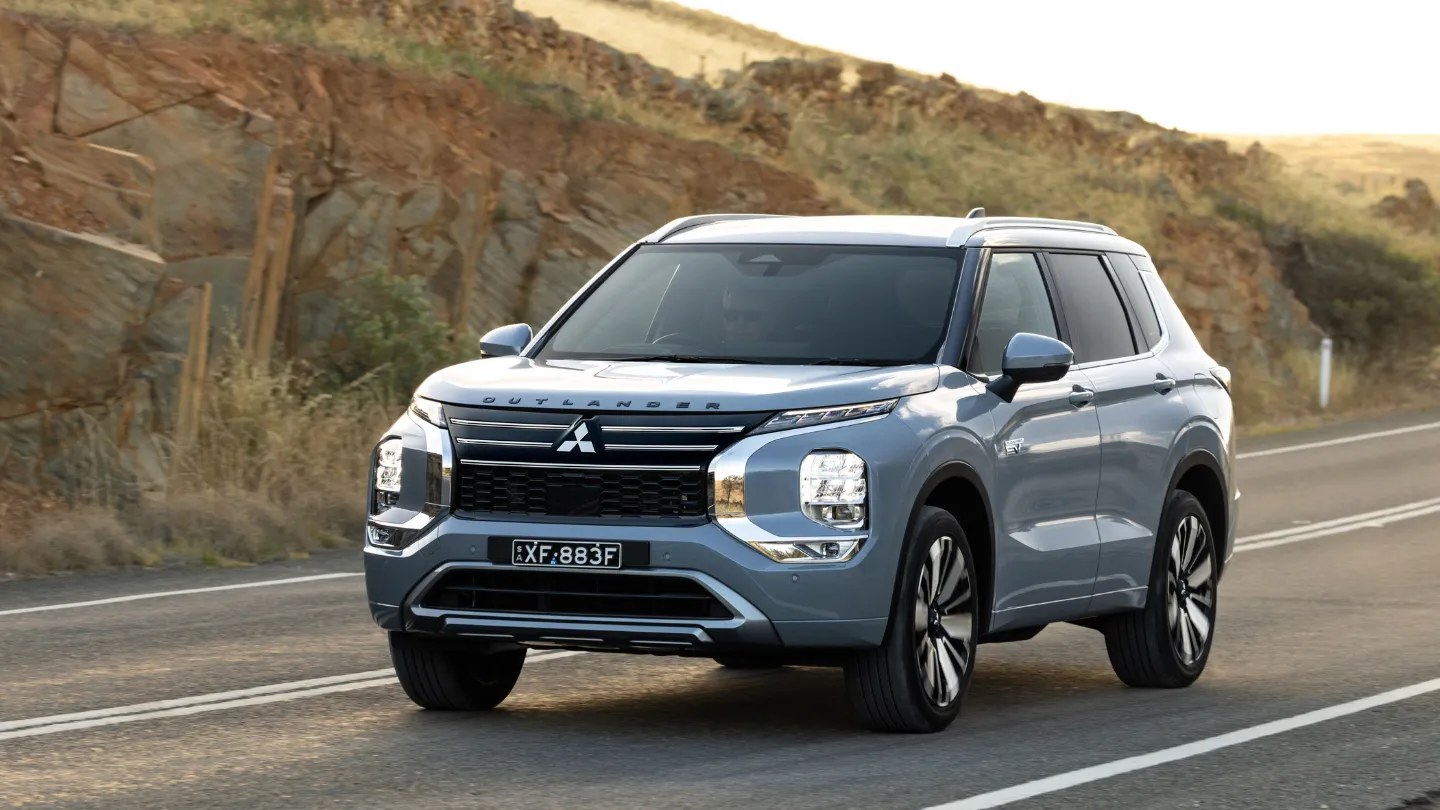 2026 Mitsubishi Outlander PHEV front view on the road