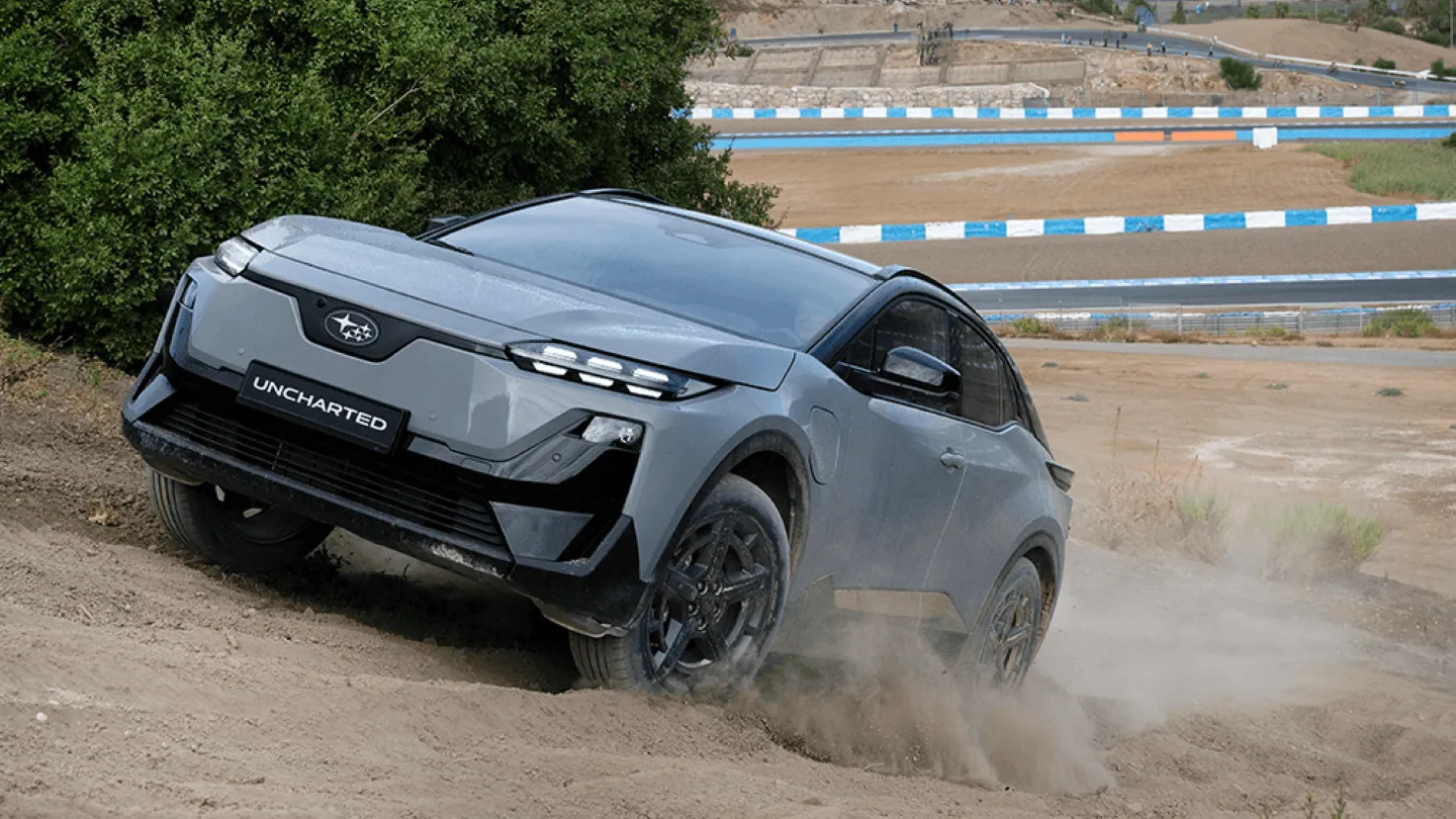 Subaru Uncharted electric SUV off roading going up incline