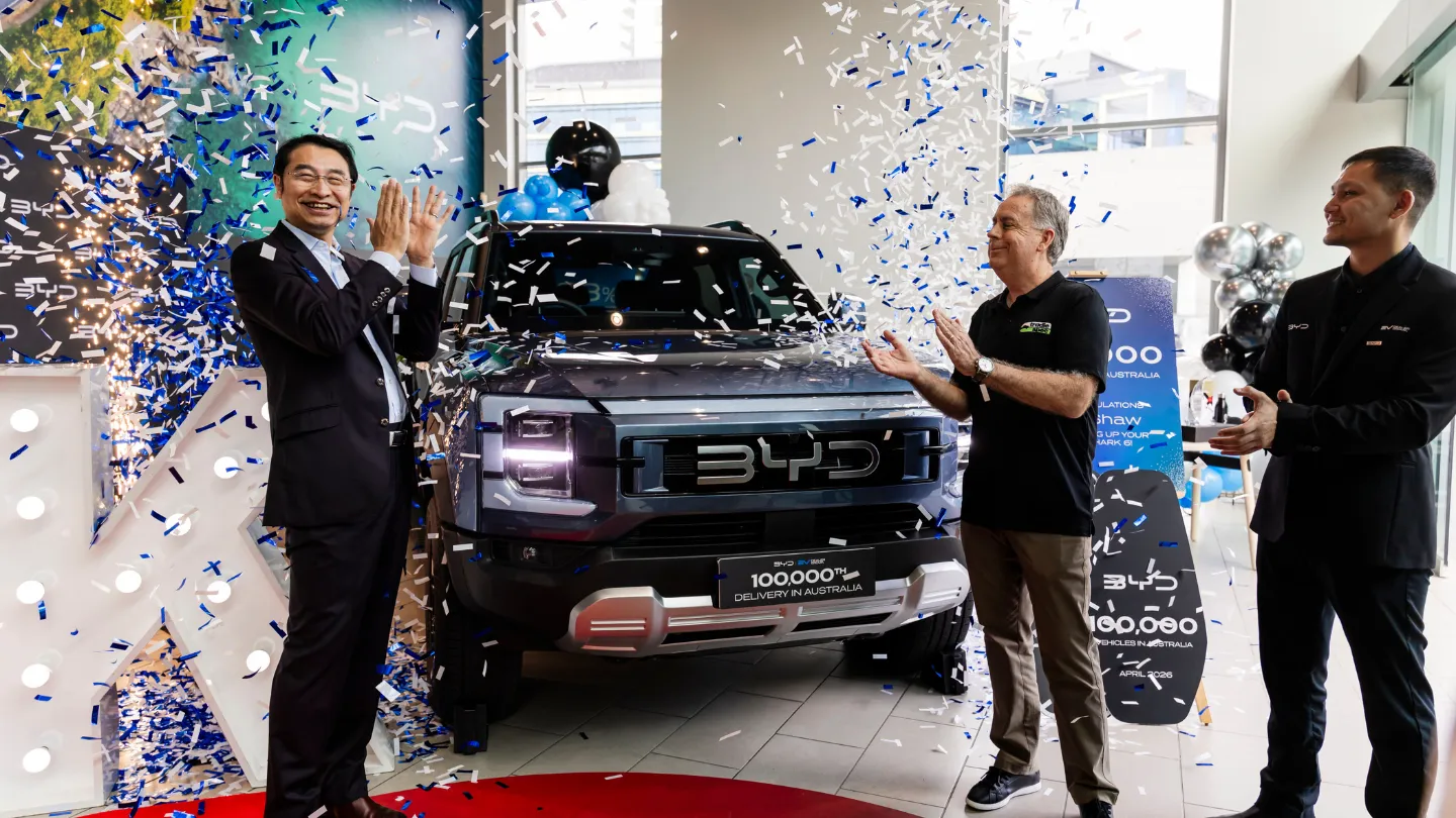 BYD Mr Liu and 100000th customer Tim Shaw