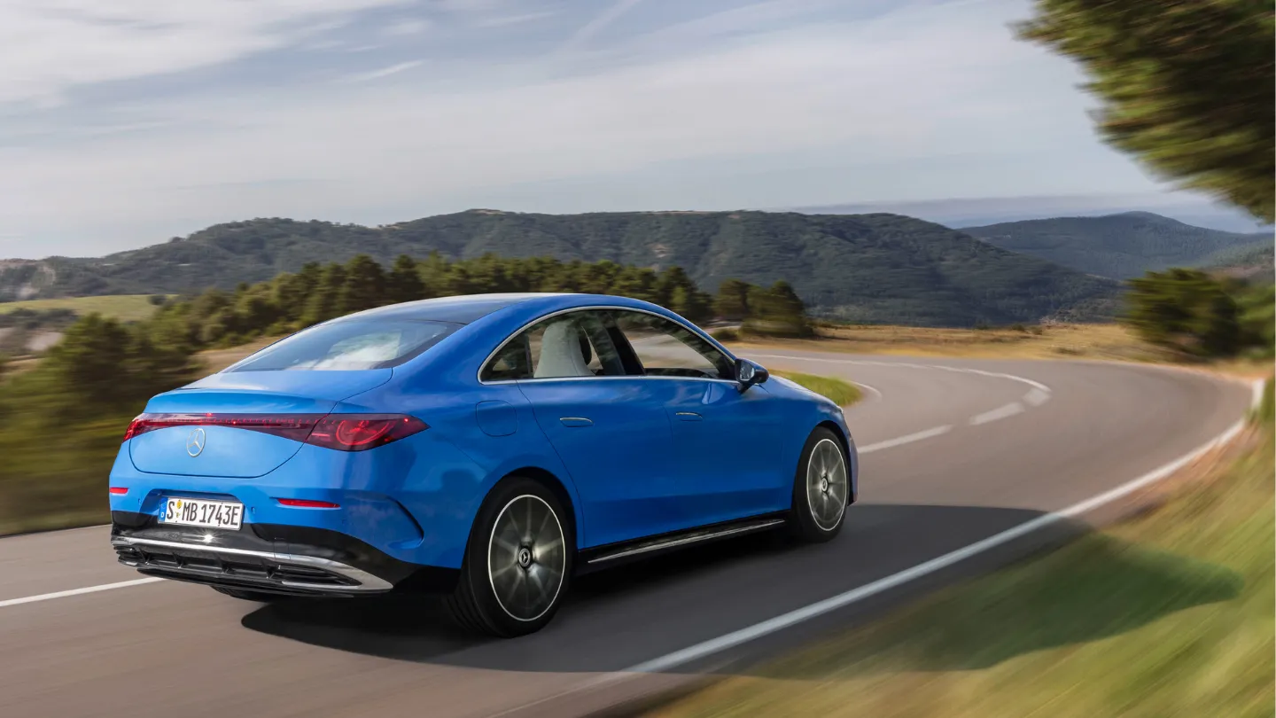 2026 Mercedes-Benz CLA electric variant rear view on the road