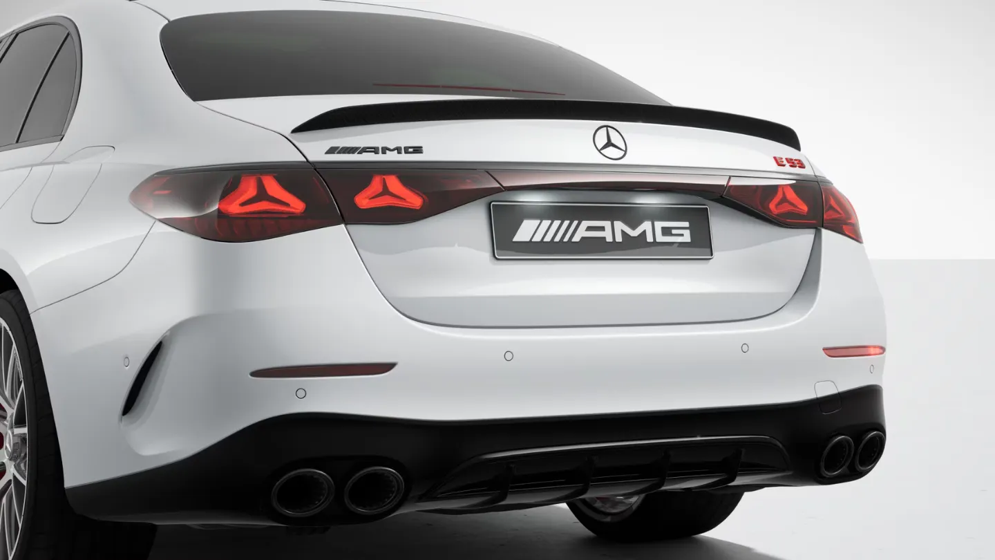 Mercedes-AMG E 53 Hybrid Dark Carbon Edition night package 2 opalite white close up rear view