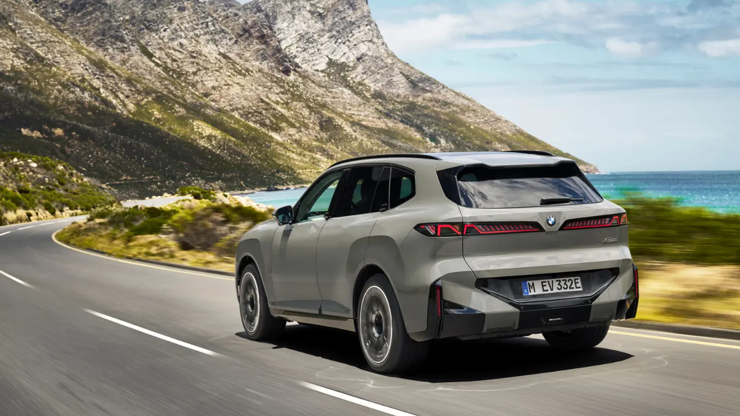 2027 BMW iX5 exterior on the road rear