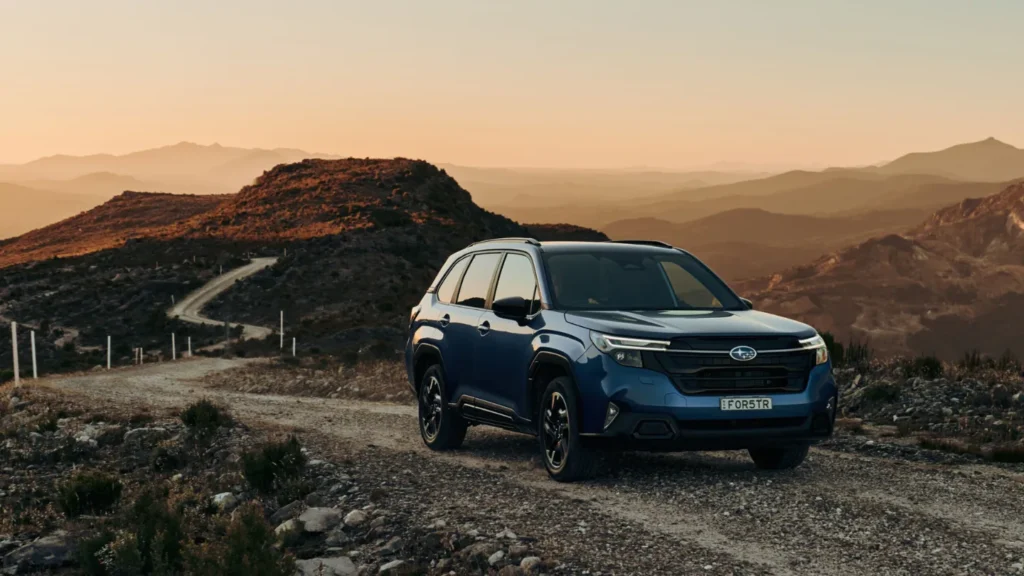 sixth generation Subaru Forester Hybrid on a rural road