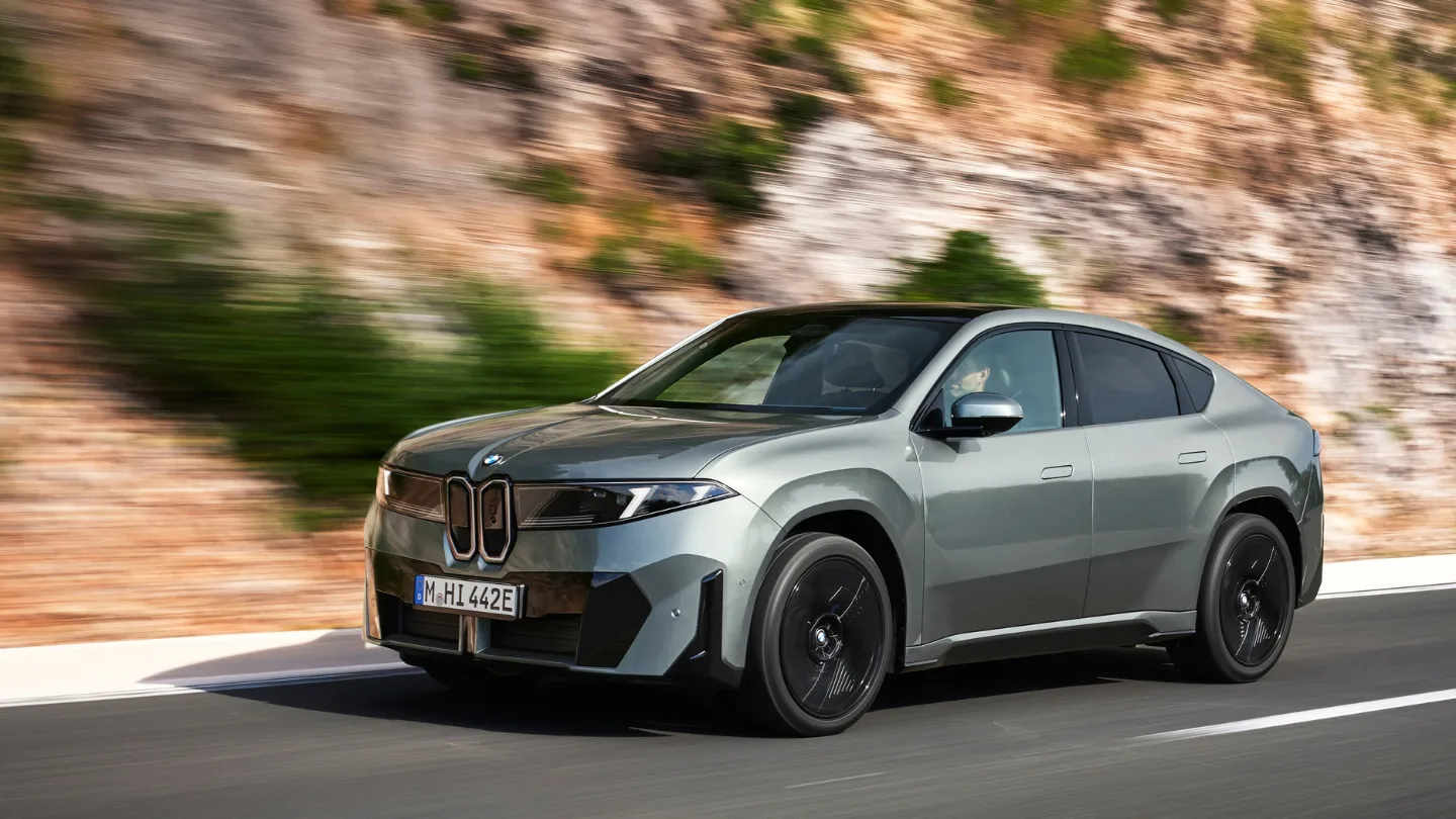 2027 BMW iX4 EV coupe exterior front side