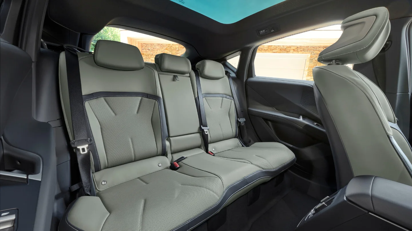 2027 BMW iX4 EV coupe interior cockpit rear seats